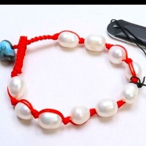 NWT AQUA (BLOOMINGDALE’S) RED THREAD WHITE AND BLUE BEAD BRACELET
